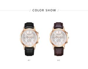Detail view of quartz watches in rose gold with black and brown leather straps