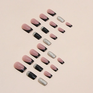 Square black French press-on nails with silver glitter accents and nude pink base