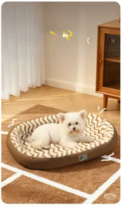 Detail of warm rectangular pet bed with brown leather exterior and soft wavy fleece cushion