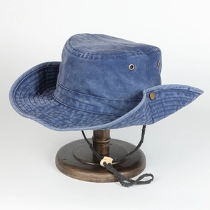 Detail of washed cotton sun hat with side metal snaps and breathable ventilation holes
