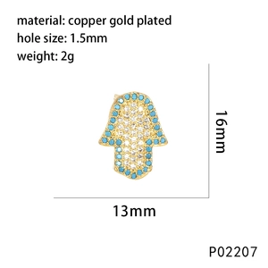 Detailed size view of Hamsa Hand charm featuring pavé cubic zirconia and gold plating