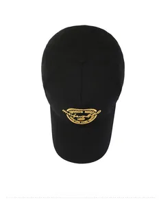Top view of a black cotton baseball cap with premium gold embroidered sports logo details