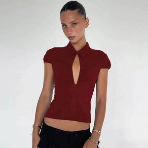 Detail of dark red short sleeve shirt with trendy teardrop cutout and collar