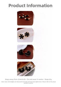 Detail of four black braided leather hoop earrings with vintage gold alloy accents