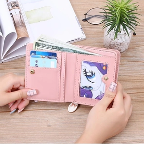 Detailed interior of a pink cute cat wallet featuring multiple card slots and cash pocket
