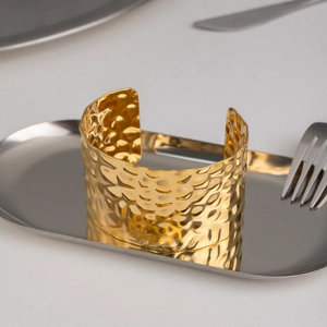 Wide 18K gold plated stainless steel open cuff bracelet with hammered texture design