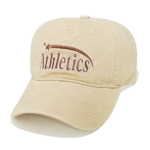 Close-up of Athletics embroidery and stitching on a khaki cotton canvas baseball cap