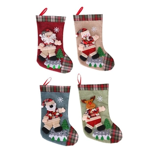 Set of four colorful Christmas stockings with 3D Santa, Snowman, Bear and Reindeer characters