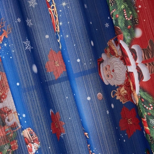 Detailed view of American style Christmas curtain fabric with festive Santa and reindeer print