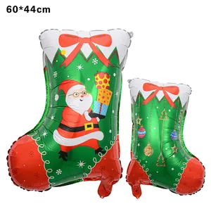 Detailed view of Christmas stocking foil balloons with Santa Claus and Merry Christmas print