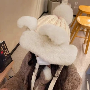 Winter plush trapper hat for women with faux fox fur ears and white knitted warm earflaps