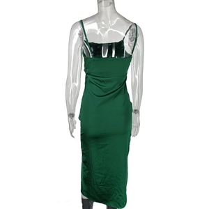 Rear view of green satin camisole dress showing thin straps and sleek fabric texture