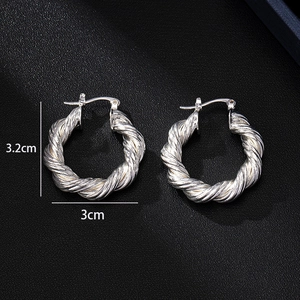 Silver twisted hoop earrings with 3.2cm height and 3.0cm width minimalist design