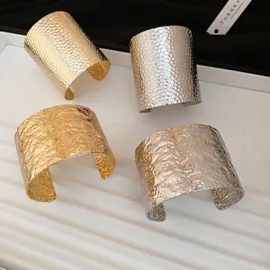 Irregular textured metal cuff bracelets in gold and silver finish for women