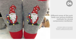 Detail of Christmas crew socks showing gnome embroidery and reinforced knit texture