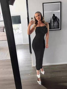 Sexy black tube top bodycon midi dress with 3D floral accent and ruched texture details