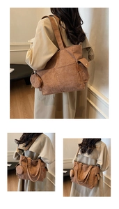 Brown corduroy tote bag detail showing shoulder and crossbody wear with small pouch