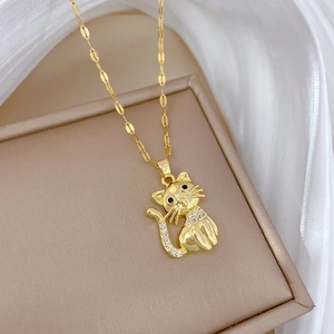 Luxurious cat pendant necklace with black zircon eyes and white crystals on silk