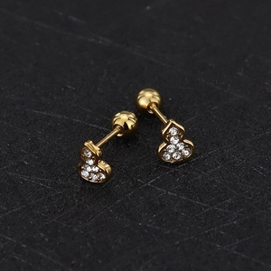 Macro shot of gold gourd screw-back stud earrings with sparkling zircon inlay