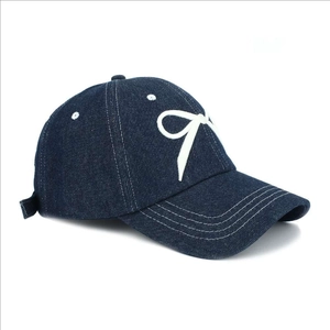Classic dark blue denim baseball cap with white embroidered b letter and curved brim