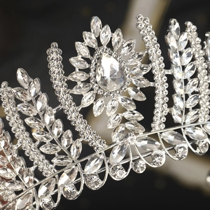 Luxurious vintage bridal crown with silver floral patterns and crystal rhinestones