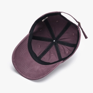 Inside view of purple cotton baseball cap with six-panel structure and adjustable strap