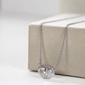 Detailed macro view of S925 sterling silver perfume bottle pendant with oval zircon stone