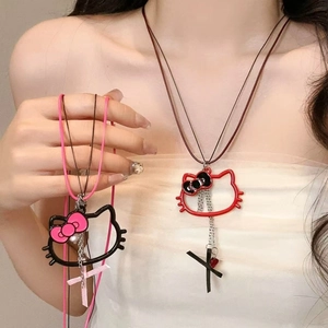 Minimalist wax cord necklace with hollow cartoon cat pendant and metal tassel detailing