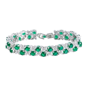 Exquisite silver bracelet with vibrant emerald green zircons and sparkling white stones