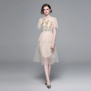 Elegant light pink embroidered tulle midi dress with delicate floral mesh layered skirt