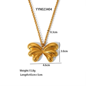 Polished gold butterfly pendant necklace with size specs on a clean white background