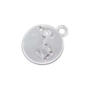 Close-up of silver constellation pendant with zircon stones showing Scorpio sign