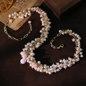 Elegant white freshwater pearl necklace with adjustable gold lobster clasp chain