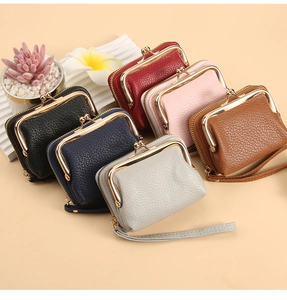Group display of colorful pebble leather card holders with wristlets and gold zippers