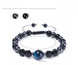 Detailed view of 8mm tiger eye and hematite beaded bracelet with adjustable cord