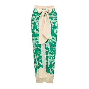 Floral print wrap sarong skirt with cream bow waist detail for beach resort styling