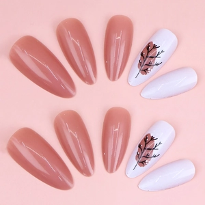 Long almond press-on nails in nude pink with hand-painted artistic plant silhouettes