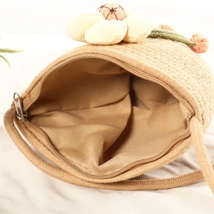 Beige woven cotton mini shell bag with sunflower decor and metal zipper closure