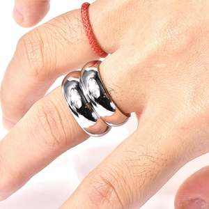 Detailed view of wide double-layer 18K gold-plated stainless steel ring on model
