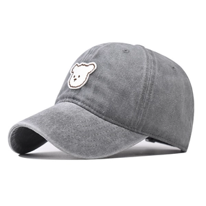 Detail of cute bear embroidery on dark gray washed cotton vintage baseball cap
