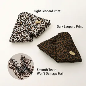 Pinces à cheveux en tissu léopard avec motifs clairs et foncés et dents lisses