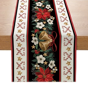 Christmas table runner with festive poinsettia, bells and candy cane patterns