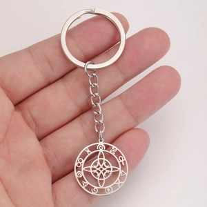 Silver stainless steel keychain with Celtic knot moon pendant and mystic symbols