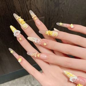 Cute yellow stiletto press-on nails with 3D bears, bows and lace texture