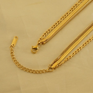 Chic multi-layered 18K gold snake bone and Figaro chain necklace with lobster clasp