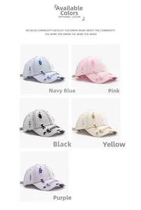 Close-up of distressed baseball caps in various colors with Gothic embroidery detail