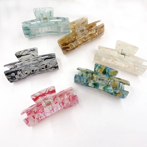 Retro acrylic hair claws with marble water ripple patterns in six assorted colors
