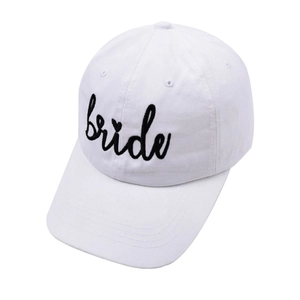 Close-up of white cotton baseball cap with black bride script embroidery for weddings