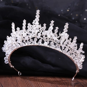 Elegant bridal crown with silver crystals and sparkling rhinestones for wedding hair styling