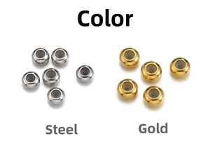 Macro detail of silver and gold stainless steel stopper beads with silicone core inserts